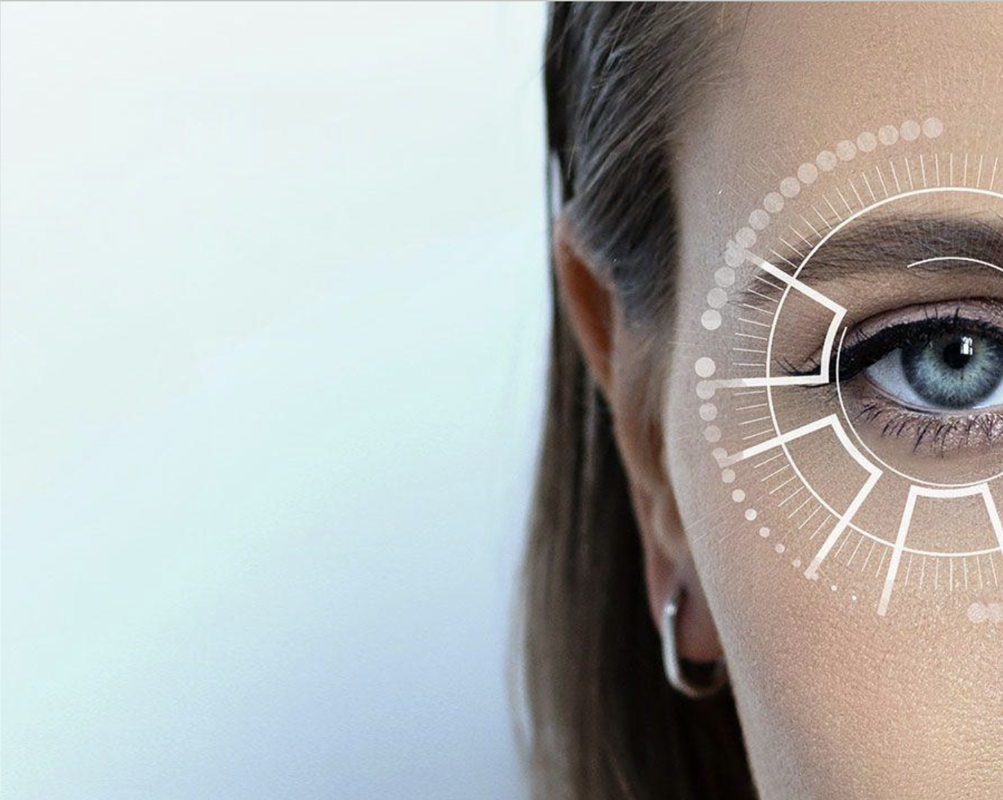 Close-up of a human eye with a futuristic targeting overlay representing glEYEco's ocular drug delivery technology